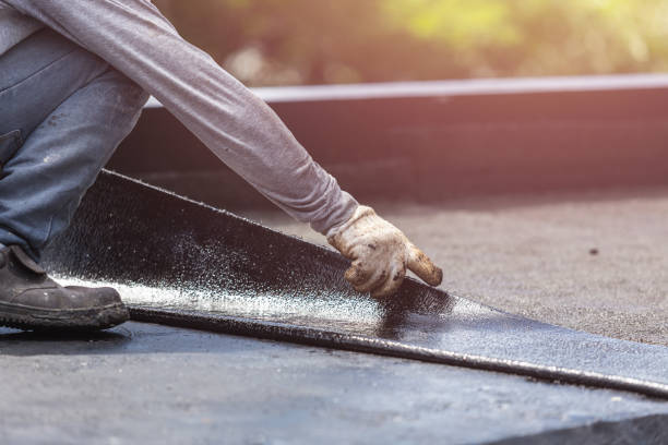 Professional Waterproofing technician working in Wyandanch, NY